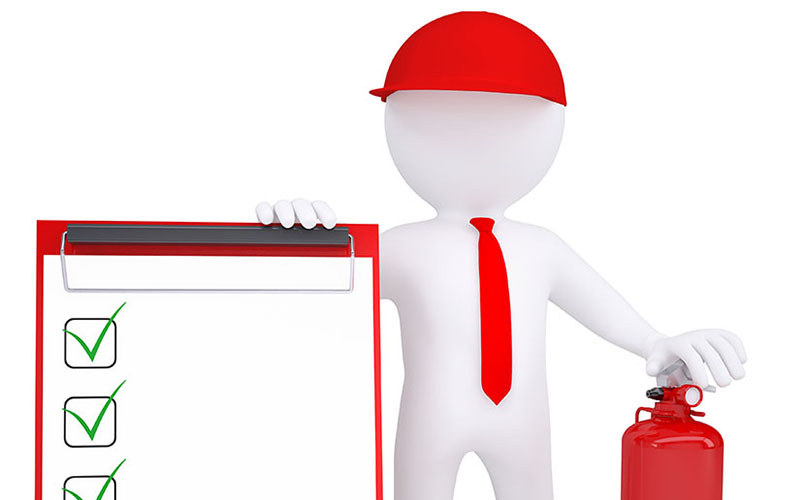 a man wearing a red hat and tie holding a clipboard